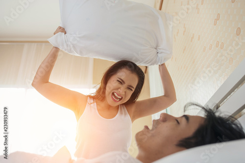 Young woman bored with her boyfriend snoring