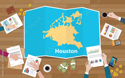 houston texas america city region economy growth with team discuss on fold maps view from top