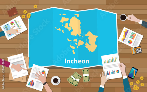 incheon south korea city region economy growth with team discuss on fold maps view from top