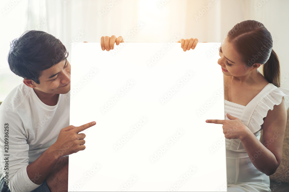 Happy couple hand holding white blank space Happy couple hand holding white blank space