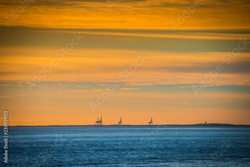 Harbor with cranes and terminal at sunset, le Verdon, Gironde, France, Europe © SpiritProd33