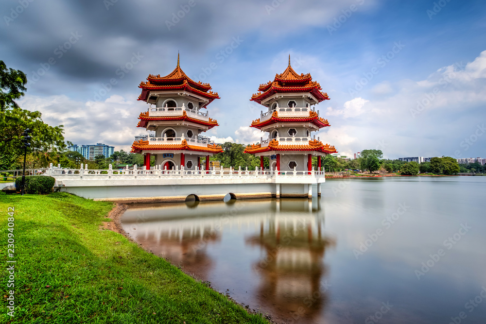 Beautiful day and cloud at Chinese Garden Twin Pagoda of Singapore with reflection