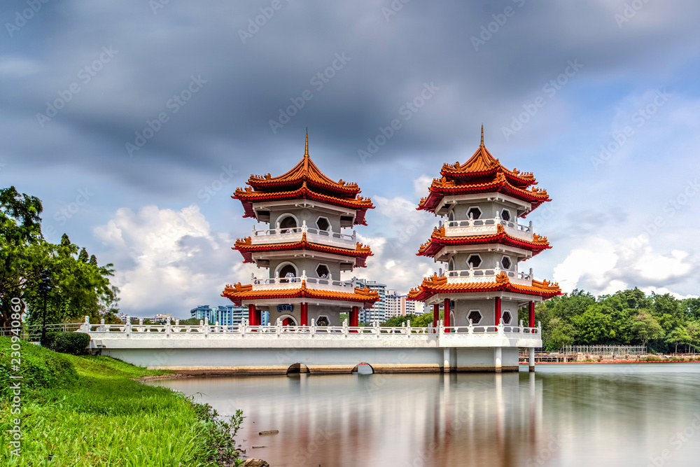 Beautiful day and cloud at Chinese Garden Twin Pagoda of Singapore with reflection