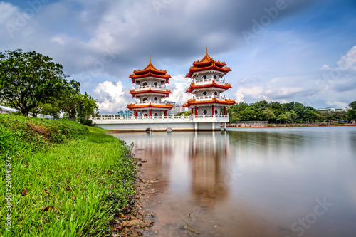 Beautiful day and cloud at Chinese Garden Twin Pagoda of Singapore with reflection
