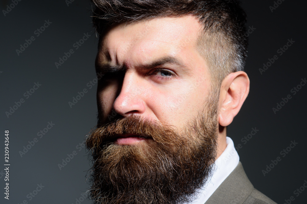 Here I am, a business man. Fashion industry. Bearded man after barber shop. Man with long beard in business wear. Business as usual. Mens fashion. The art of being a barber Here I am, a business man. Fashion industry. Bearded man after barber shop. Man with long beard in business wear. Business as usual. Mens fashion. The art of being a barber