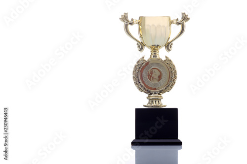 A Gold Cup On White Background