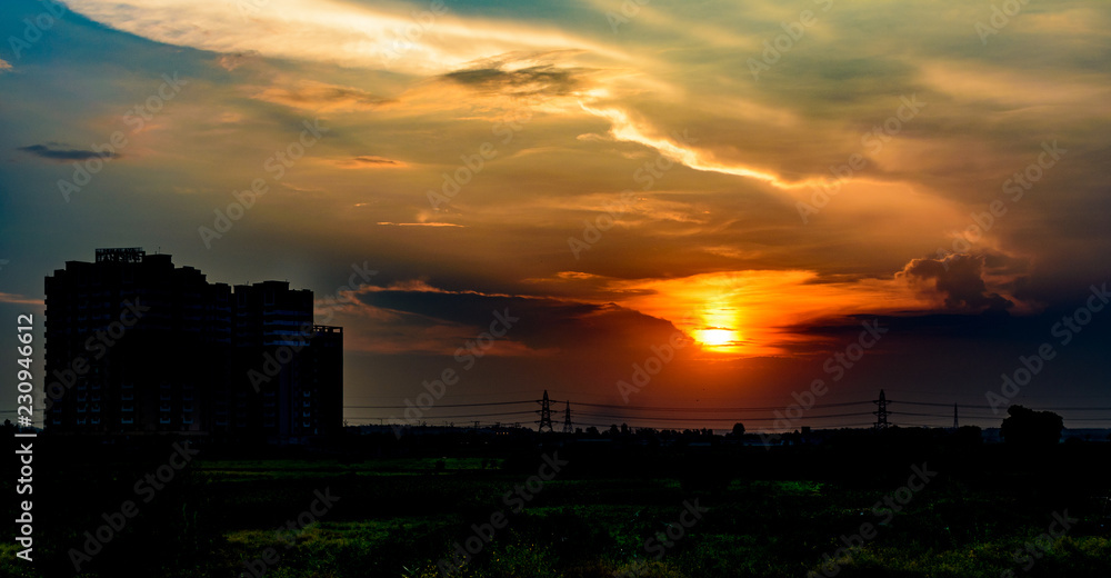 Fototapeta premium Orange sky at sunset in Delhi NCR