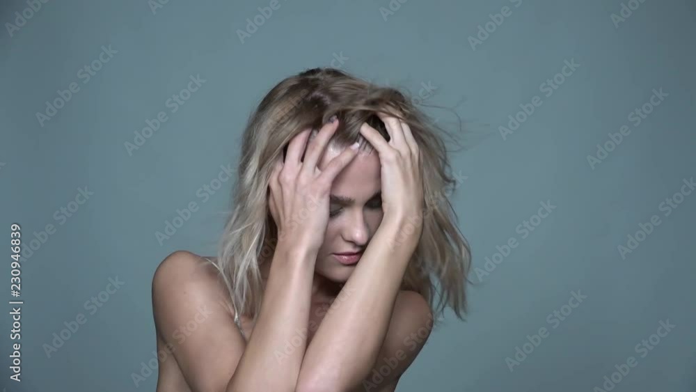 Portrait of beauty young woman in summer casual dress with shaggy hair Portrait of beauty young woman in summer casual dress with shaggy hair