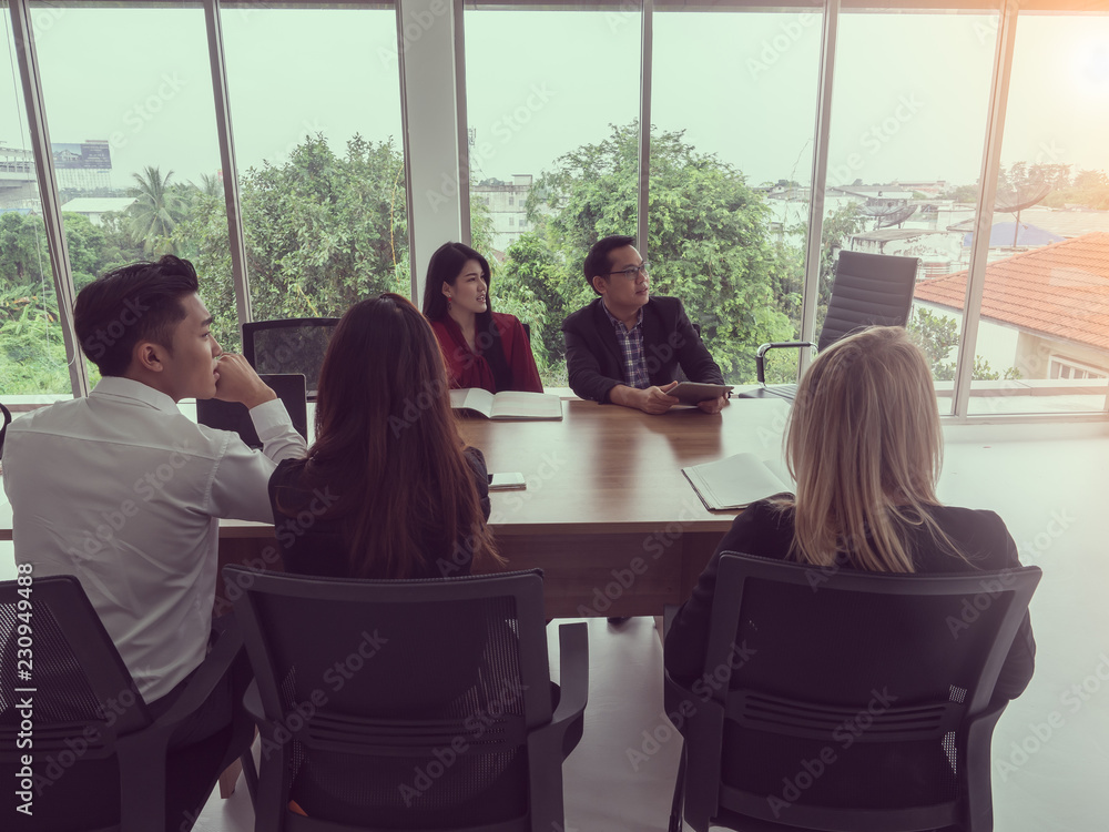 business people in board room,Businessman explaining new business ideas business people in board room,Businessman explaining new business ideas