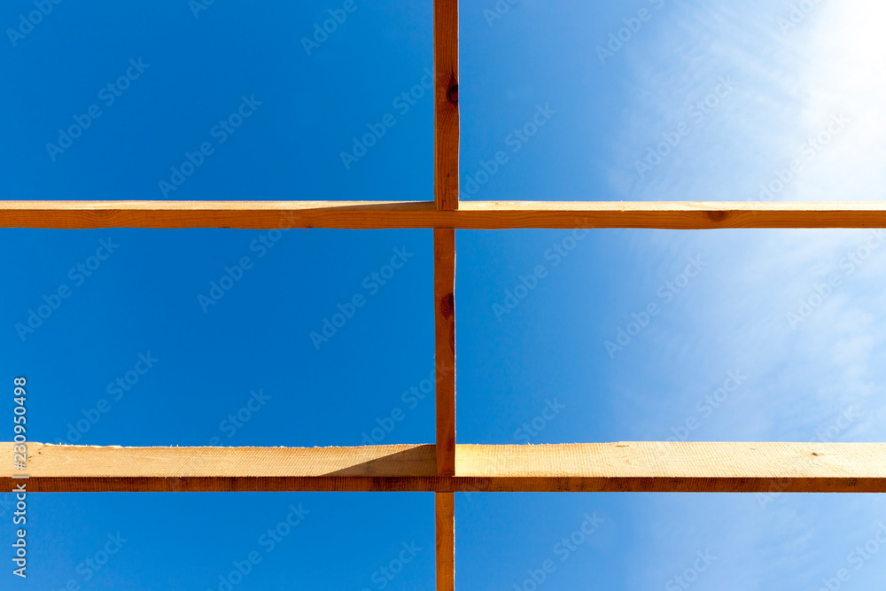 Fototapeta premium construction of a new frame house,