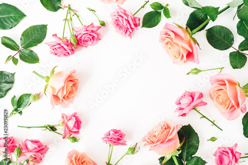 Fototapeta Naklejka Na Ścianę i Meble -  Floral round frame made of pastel roses flowers on white. Flat lay, top view.