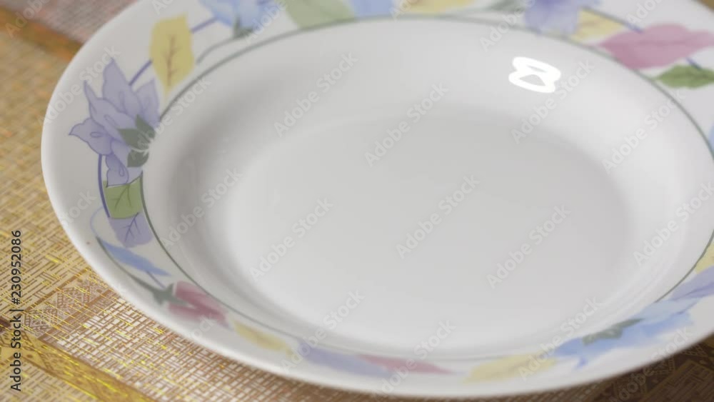 Porridge oats for breakfast as a healthy diet. Whole grain porridge cooked with water served on a plate. Porridge oats for breakfast as a healthy diet. Whole grain porridge cooked with water served on a plate.