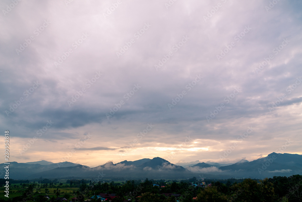 Landscape of Mountain with clouds in morning time.