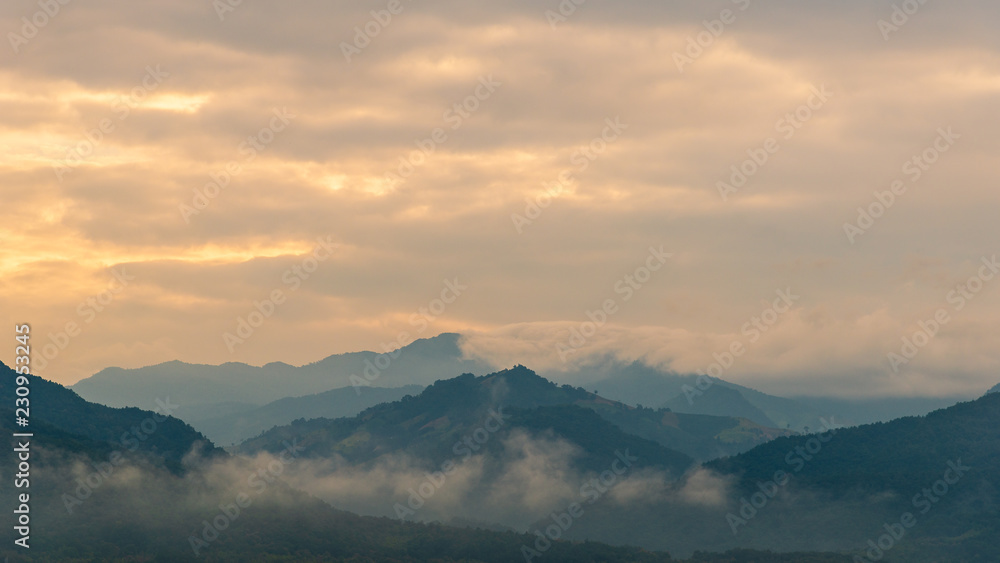 Landscape of mountain with sunrise and clouds