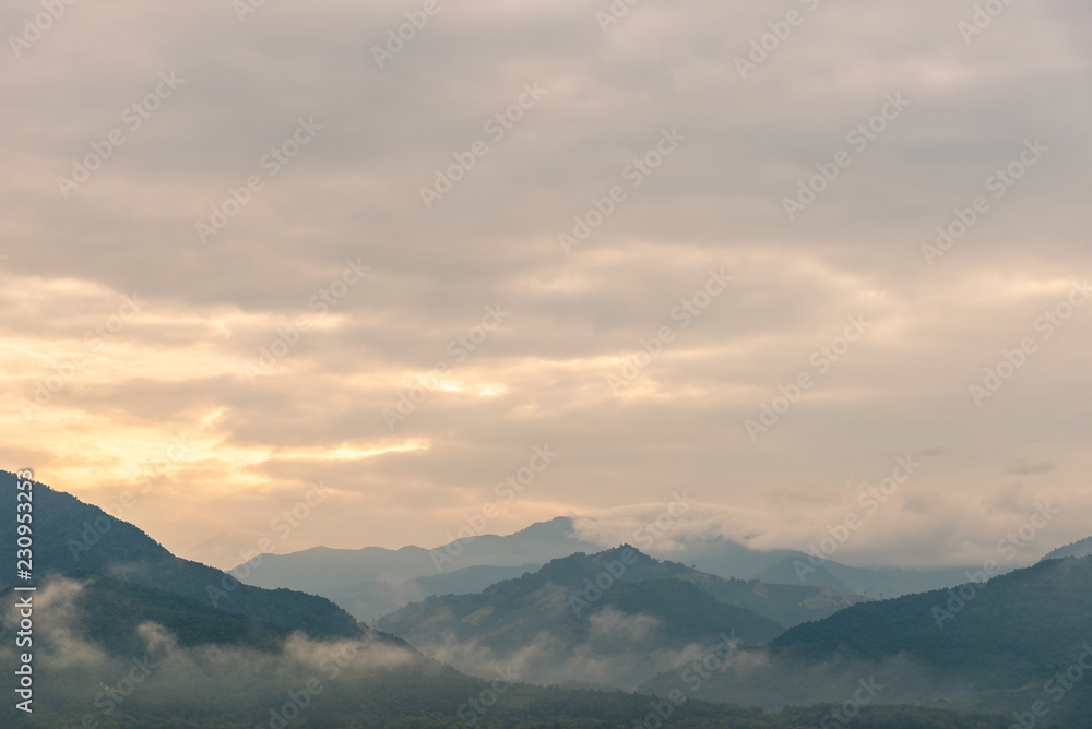 Landscape of mountain with sunrise and clouds