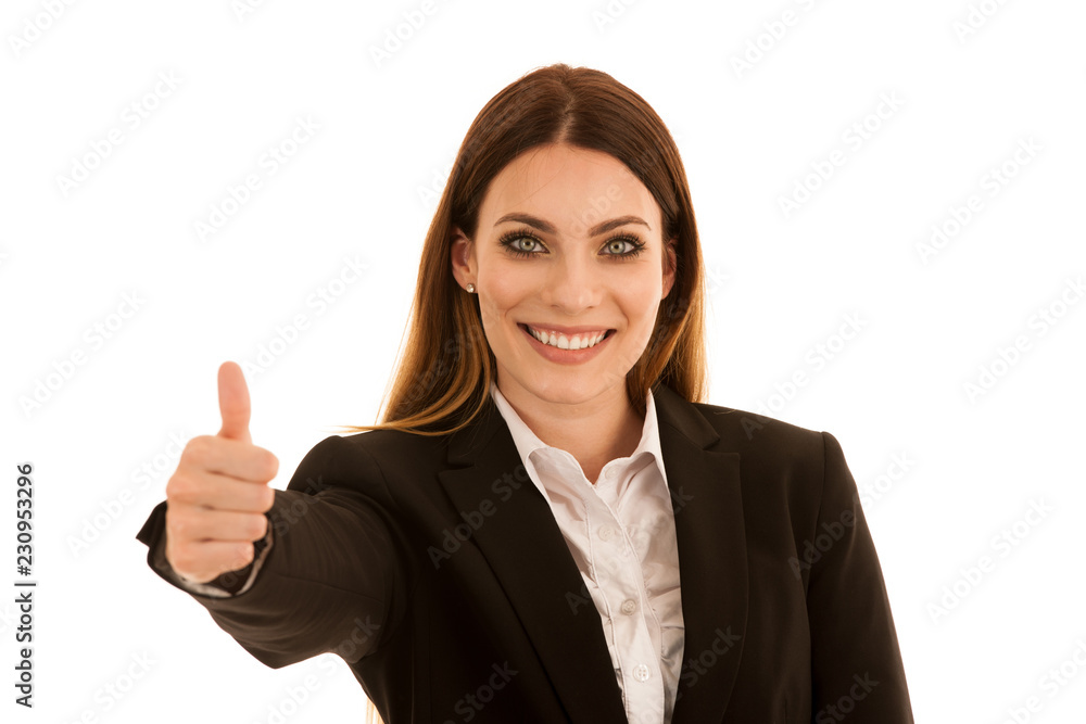 Attractive business woman showing thumb up as a gesture for success isolated over white background Attractive business woman showing thumb up as a gesture for success isolated over white background