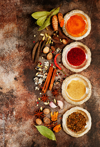 Spice Selection on brown Concrete Texture photo