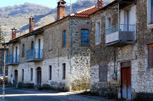 Old houses in Agios Germanos village in northern Greece photo