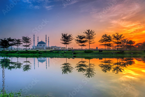 The Long Exposure Picture Of Great Mosque With Reflection On Lake