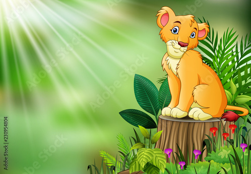 Fototapeta Naklejka Na Ścianę i Meble -  Cute a lion sitting on tree stump with green leaves and flowering plant