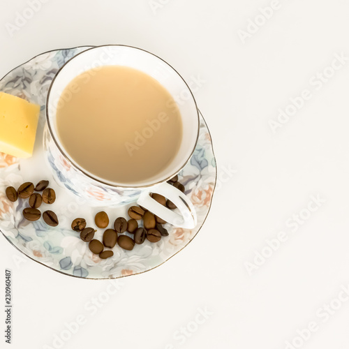 Cuadro en lienzo coffee, black or with milk, in a Cup, on a saucer is cheese