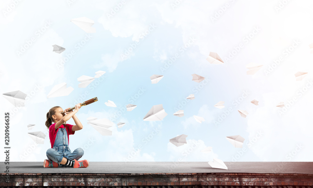 Concept of careless happy childhood with girl exploring this world Concept of careless happy childhood with girl exploring this world