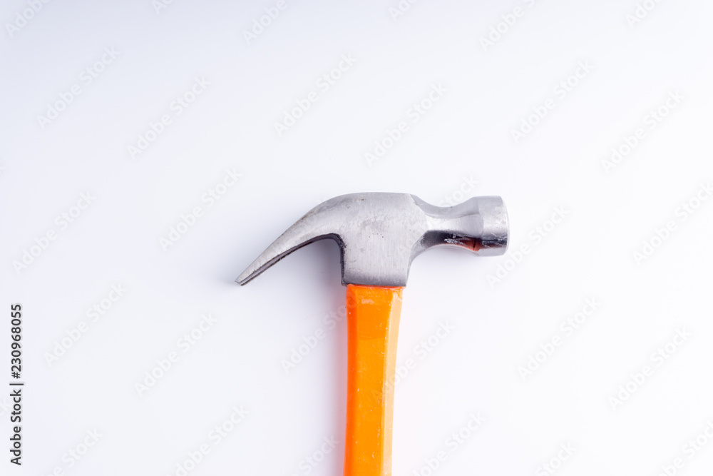 Hammer closeup on white background with selective focus and crop fragment Hammer closeup on white background with selective focus and crop fragment
