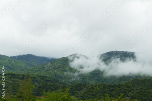 Mountain covered with clouds and fogs on top of mountain in Ratchaburi, Thailand