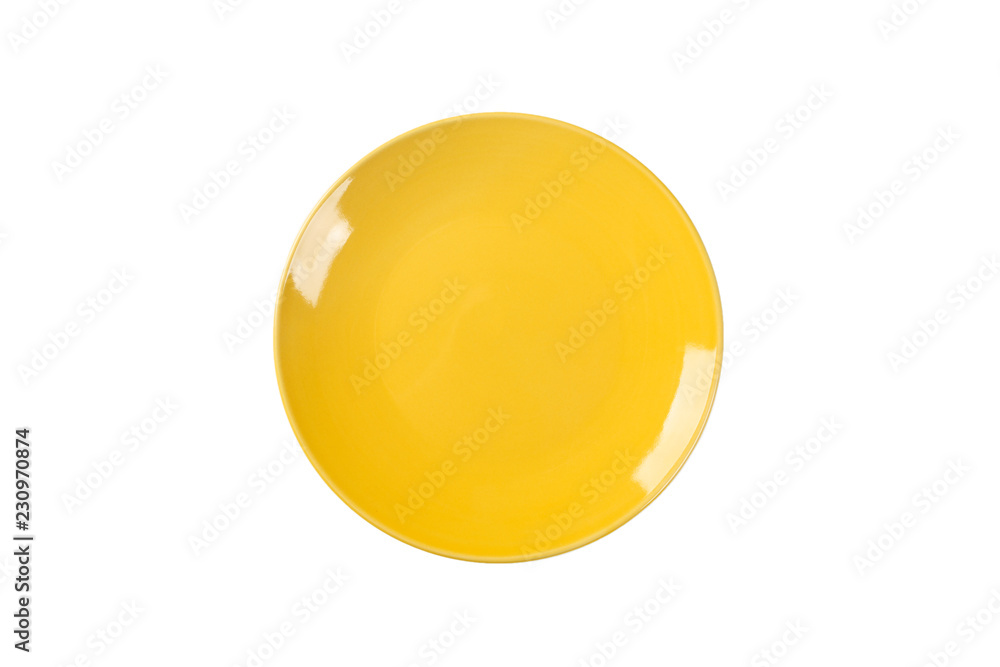 Empty yellow ceramic round plate isolated on white background. Top view Empty yellow ceramic round plate isolated on white background. Top view