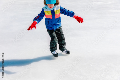 active boy skating in winter nature, seasonal sport