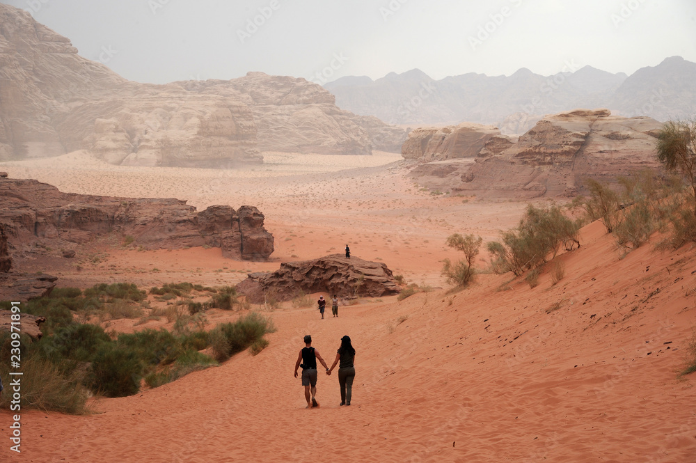 panoramic view of wadi rum desert lookin like mars planet with rocks and red sand panoramic view of wadi rum desert lookin like mars planet with rocks and red sand