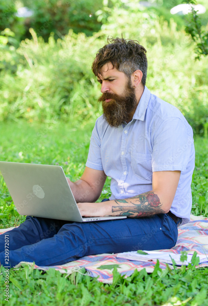 Man bearded with laptop nature background. Blogger create content for social network. Writer or blogger write post for social network. Inspiration for blogging. Blogger becoming inspired by nature Man bearded with laptop nature background. Blogger create content for social network. Writer or blogger write post for social network. Inspiration for blogging. Blogger becoming inspired by nature
