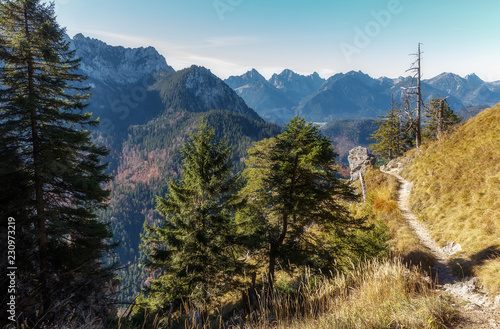 Awesome alpine highlands in sunny day. famouse tuoristic marshrute near majestic Neuschwanstein castle. near Munich in Bavaria, Germany. Popular Photography Locations. Ideas for Great Travels photo