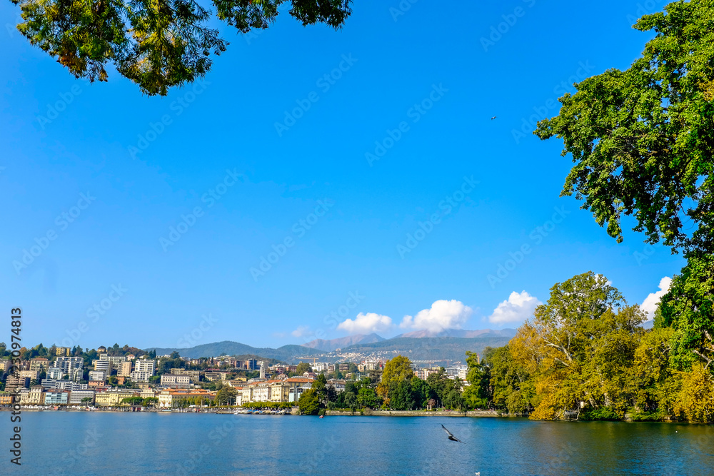 View of Lugano lake with bay, Ticino, Switzerland during a sunny day.