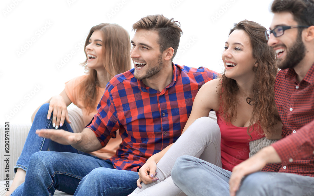young people watch your favorite show sitting on the couch. young people watch your favorite show sitting on the couch.