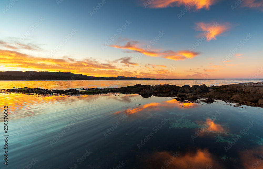 Binalong Bay, Tasmania, Australia. Sunset over the iconic Tasmanian location in the Bay of Fires.
