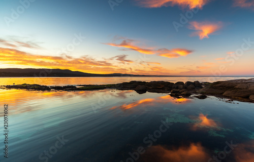Binalong Bay, Tasmania, Australia. Sunset over the iconic Tasmanian location in the Bay of Fires.