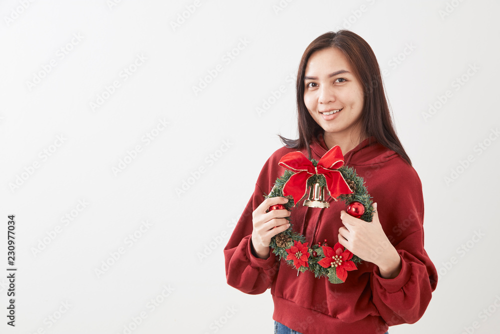 Girl holding Christmas wreath Girl holding Christmas wreath
