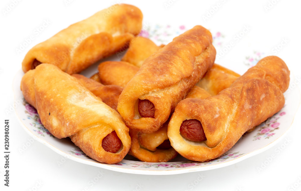 Sausage dough in a plate on a white background Sausage dough in a plate on a white background