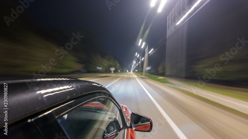 Drivelapse from top Side of Car moving on a night highway timelapse hyperlapse