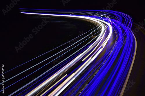 Abstract light trails on highway at night