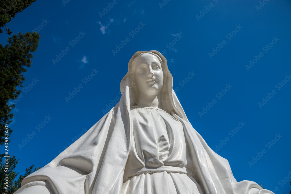 Nazareth, Israel -26 October, 2018 : Statue of Virgin Mary in courtyard of the Basilica of the Annunciation or Church of the Annunciation in Nazareth, Israel