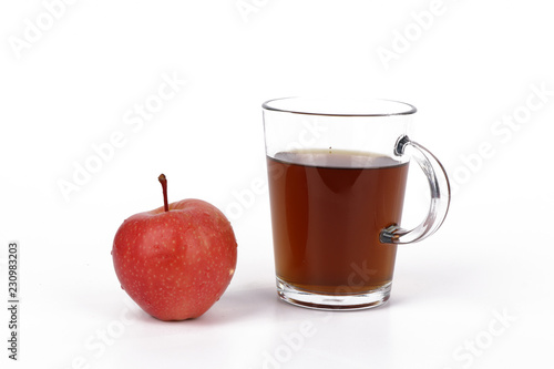 Apple and tea, cup of tea and delicious red apple isolated on white background - healthy diet