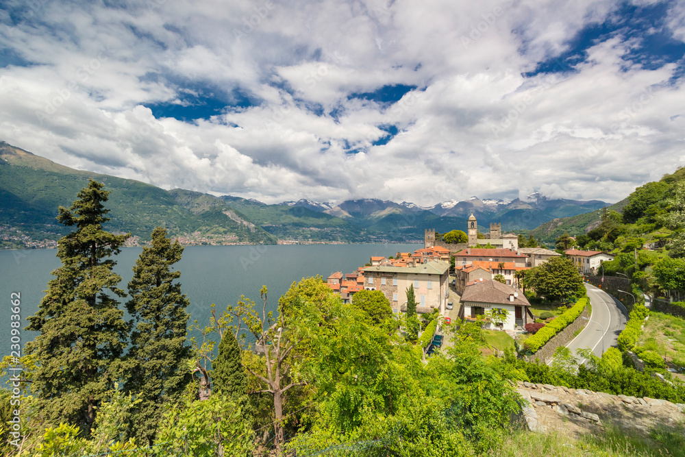 Clouds over the medieval village of Corenno Plinio and Lake Como, Dervio, Lecco province, Lombardy, Italian Lakes Clouds over the medieval village of Corenno Plinio and Lake Como, Dervio, Lecco province, Lombardy, Italian Lakes
