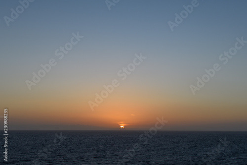 Beautiful sunset over the ocean © DOF