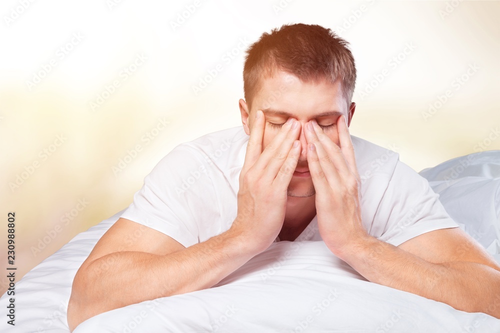 Young handsome sleeping man in bed Young handsome sleeping man in bed