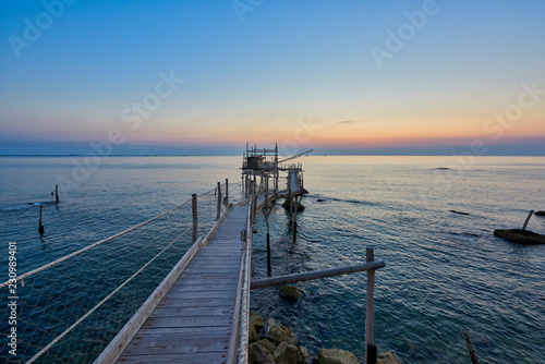 Trabocco Turchino at sunrise, Trabocchi coast, San Vito Chietino, Abruzzo photo