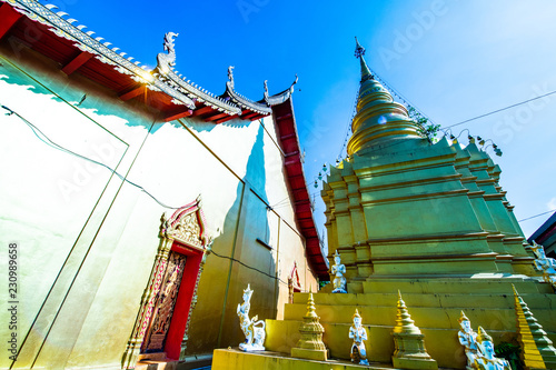 Thai style church with ancient pagoda in Pa Sang Ngam temple photo