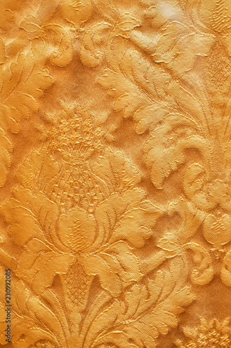 Seamless pattern. Golden textured curls. Brilliant lace, stylized flowers. Openwork weaving delicate, golden background,