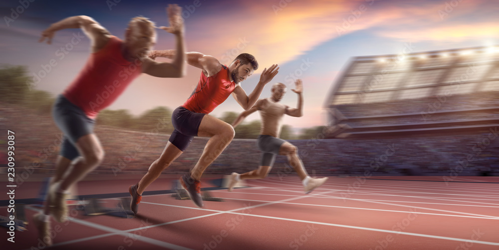 Foto Stock 3 men run Male athletes sprinting. Three men in sport clothes run at the running track in professional stadium Adobe Stock